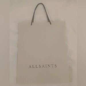 New, perfect condition medium size shopping bag. No creases. No wrinkles.
